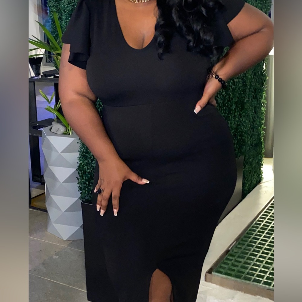 Black dress with frill detailed sleeves